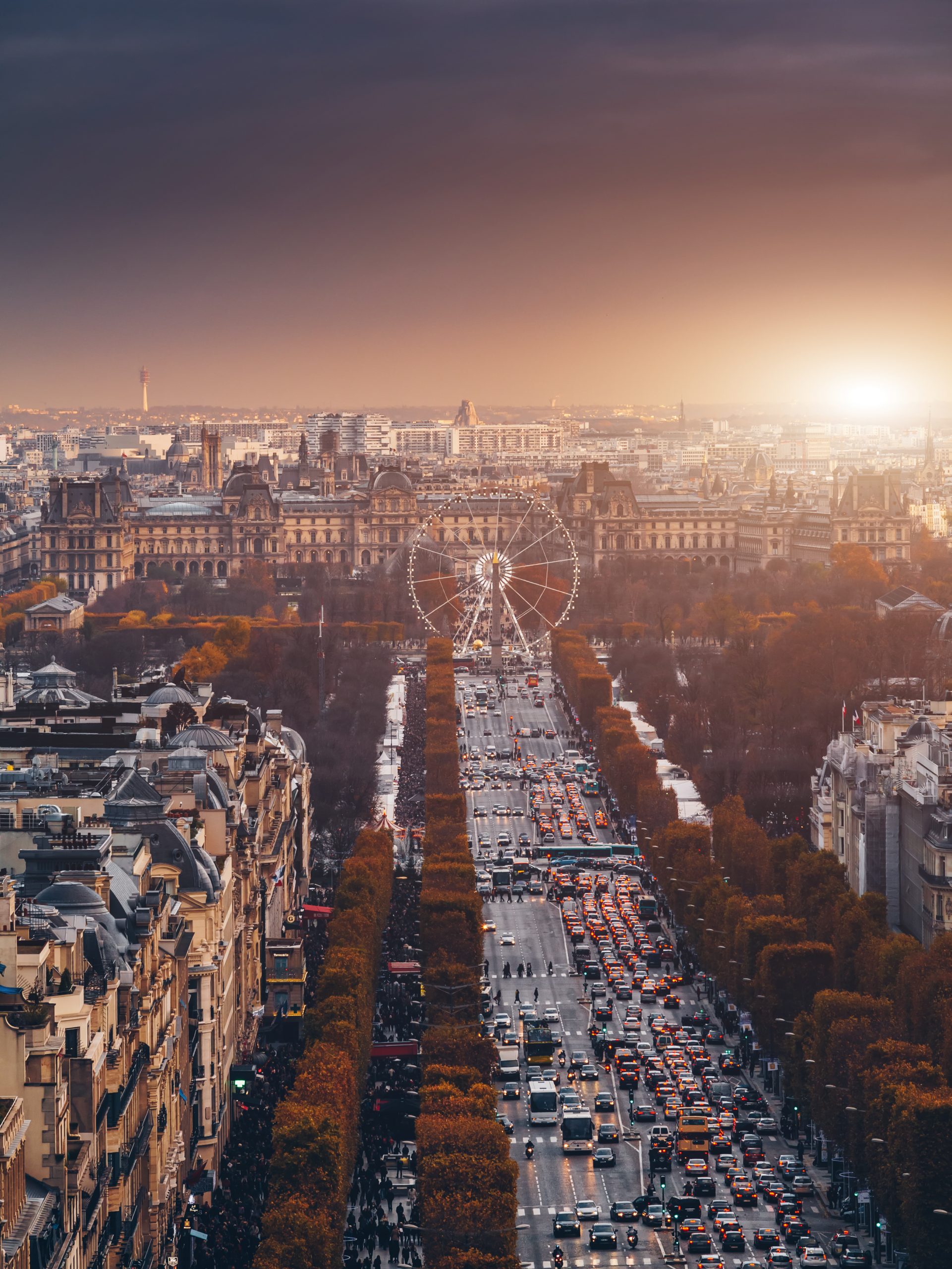 View of Champs Elysees street. The street is one of the most expensive strips in the world.Famous touristic places in Europe. European city travel concept.
